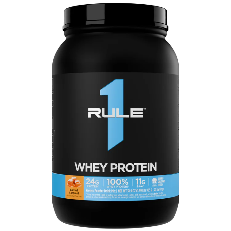 Black container of Rule 1 Whey Protein on a white background